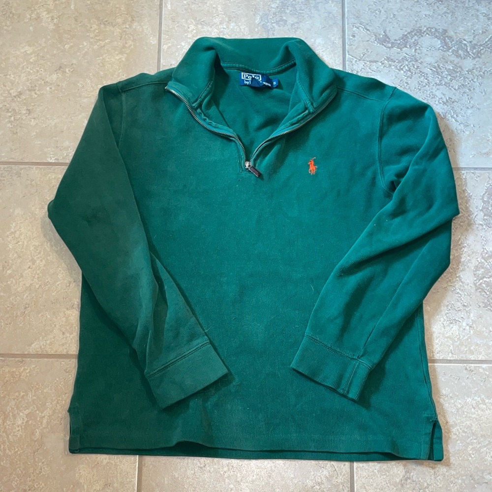 green polo sweater